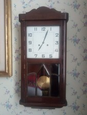 Orologio da parete a pendolo