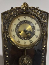 Orologio a pendolo da parete