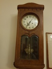 orologio a pendolo in legno