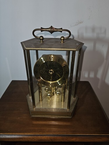 Orologio pendolo torsione - a,